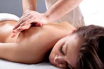 Woman receing Swedish Massage